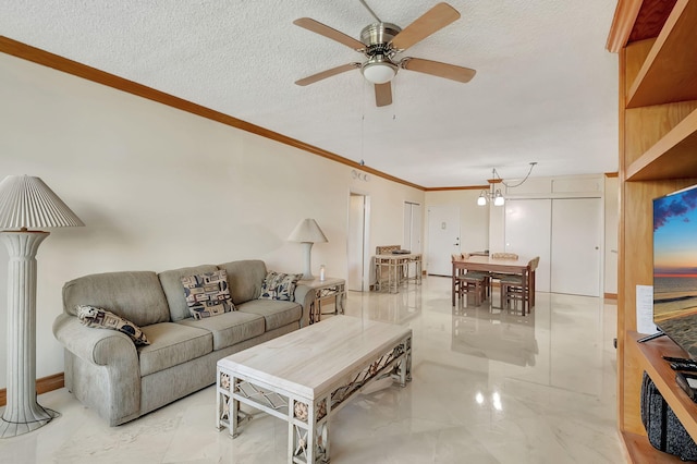 living room with crown molding, a textured ceiling, and ceiling fan