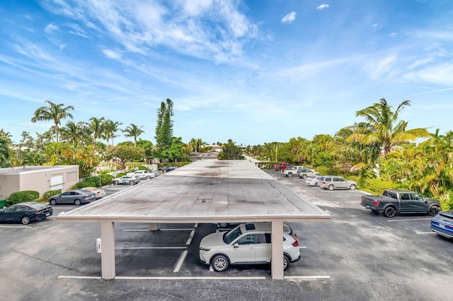 view of parking with a carport