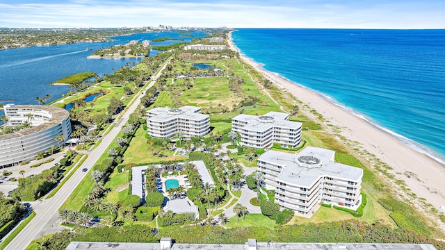 aerial view featuring a water view and a beach view