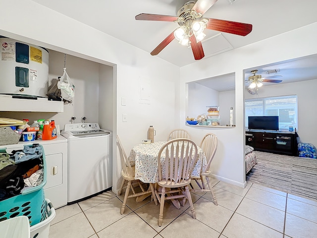 dining area with separate washer and dryer, light tile patterned flooring, and ceiling fan