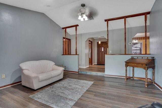 sitting room featuring vaulted ceiling, hardwood / wood-style floors, and ceiling fan