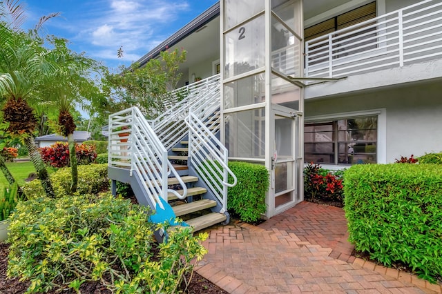 entrance to property with a balcony