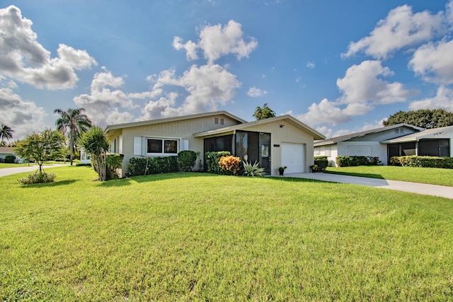 6357 Stanley Ln, Delray Beach, FL 33484 - ranch-style house with a garage, driveway, a front yard, and a sunroom