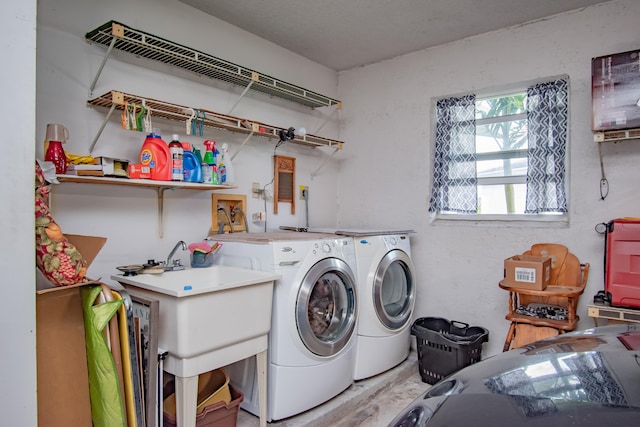 washroom featuring washer and dryer