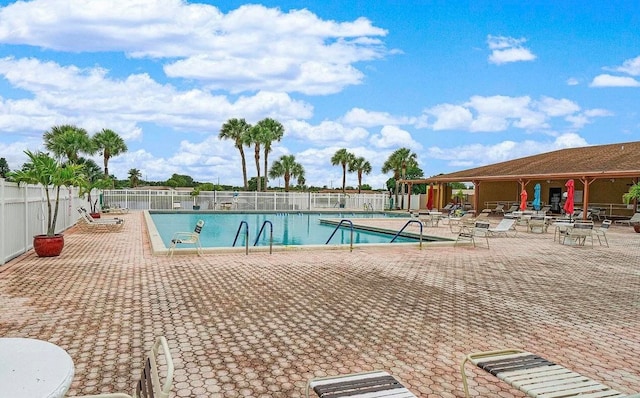 view of pool featuring a patio area