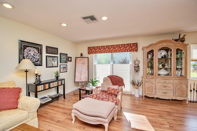 6357 Stanley Ln, Delray Beach, FL 33484 - living area featuring healthy amount of natural light, light wood-style floors, recessed lighting, and baseboards