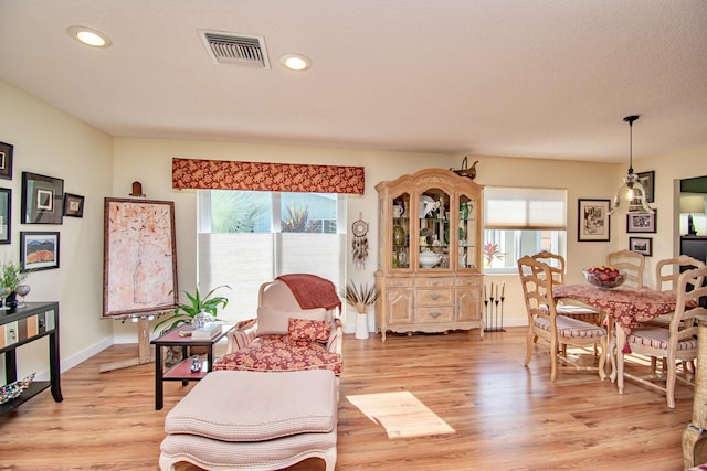 6357 Stanley Ln, Delray Beach, FL 33484 - living area featuring light wood-style flooring, recessed lighting, and baseboards