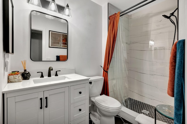 bathroom featuring toilet, vanity, and a shower with shower curtain