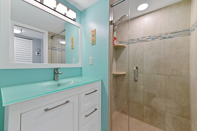 bathroom with vanity and an enclosed shower