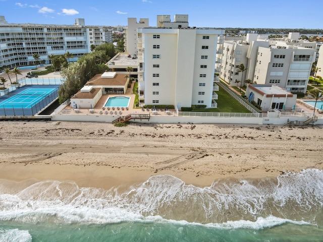 aerial view featuring a water view and a view of the beach