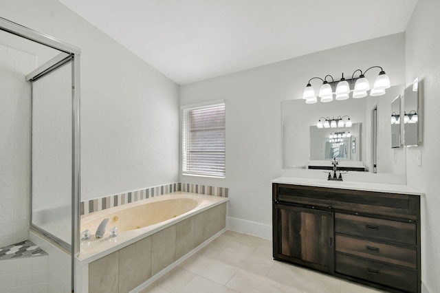 bathroom with tile patterned flooring, vanity, and separate shower and tub