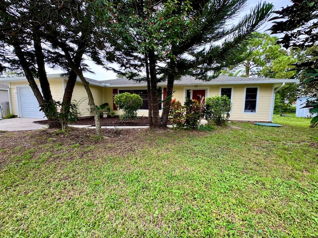 ranch-style house with a front lawn and a garage