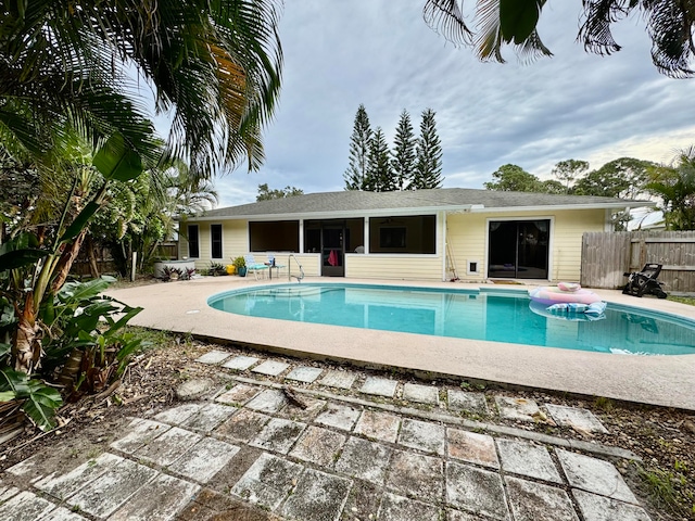 view of swimming pool featuring a patio area