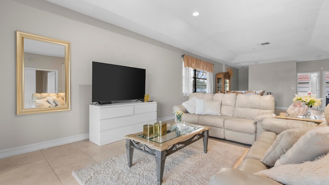 living room featuring light tile patterned flooring