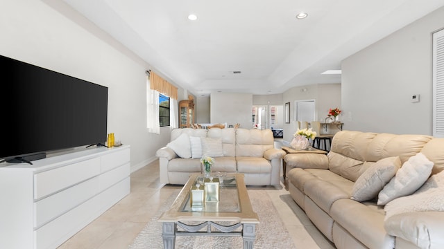 living room featuring light tile patterned floors