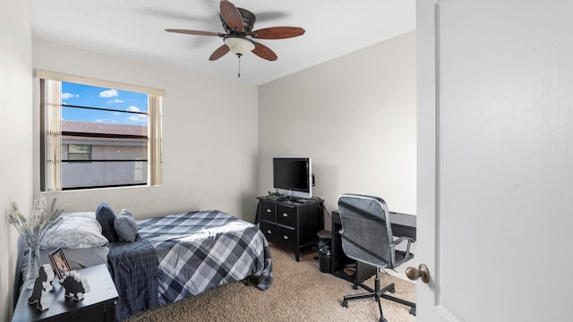 carpeted bedroom featuring ceiling fan