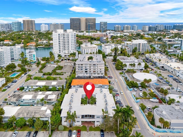 birds eye view of property featuring a water view