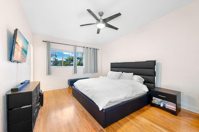 bedroom featuring ceiling fan and light hardwood / wood-style flooring