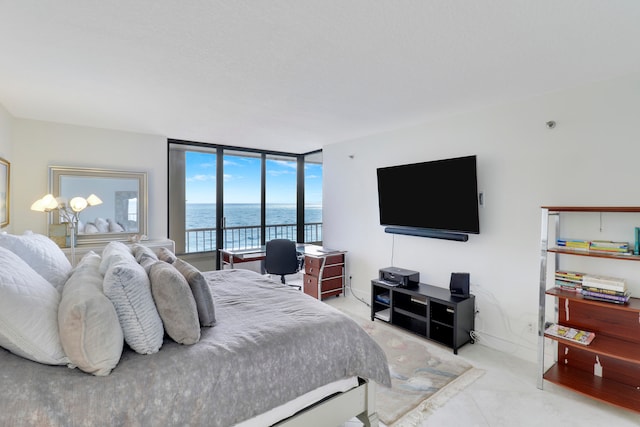 bedroom with floor to ceiling windows