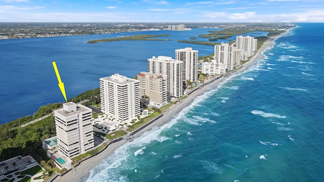 bird's eye view with a beach view and a water view