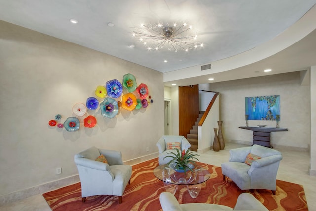 living room featuring a notable chandelier