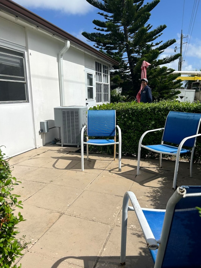 view of patio / terrace featuring cooling unit