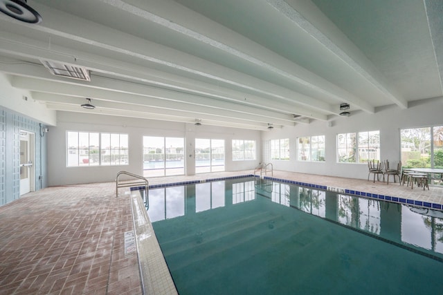 view of swimming pool featuring ceiling fan