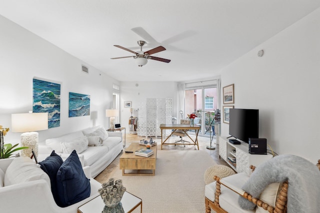 living room with ceiling fan