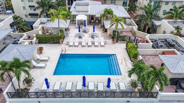 view of swimming pool featuring a patio area