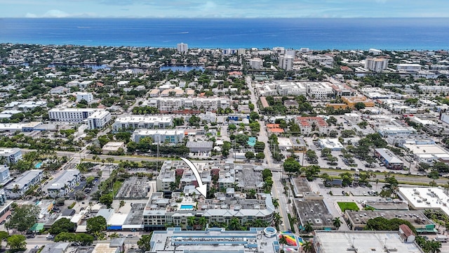 drone / aerial view featuring a water view