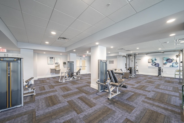 gym with dark carpet and elevator