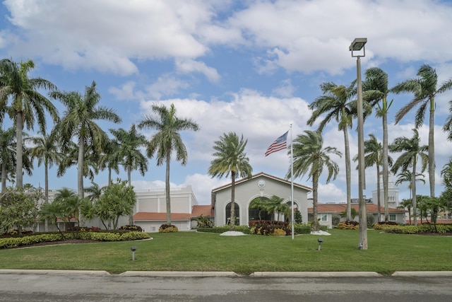 view of community featuring a lawn