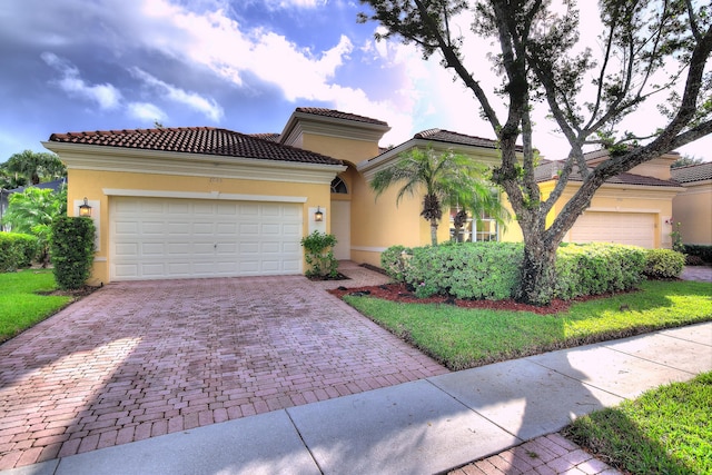 mediterranean / spanish-style home featuring a garage