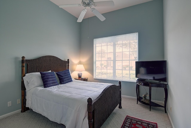 bedroom featuring ceiling fan and light colored carpet