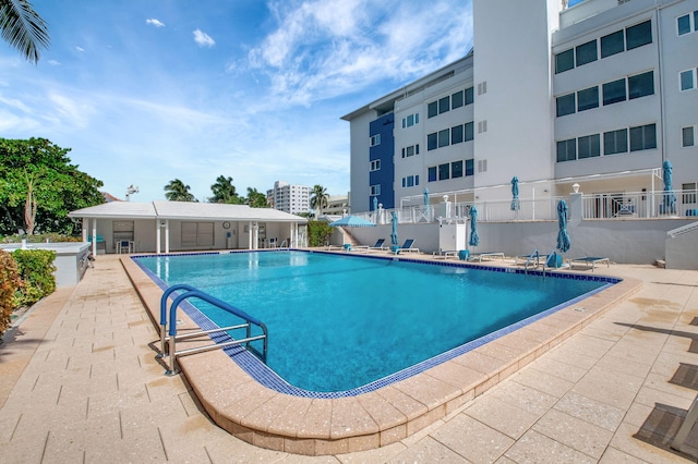 view of pool with a patio area