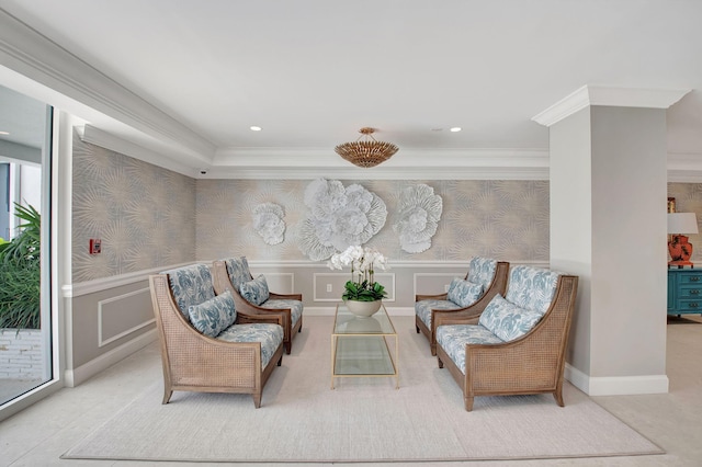 living area with crown molding