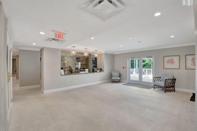 unfurnished living room featuring french doors and ornamental molding