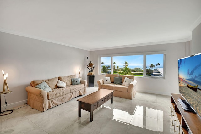 living area with baseboards and crown molding