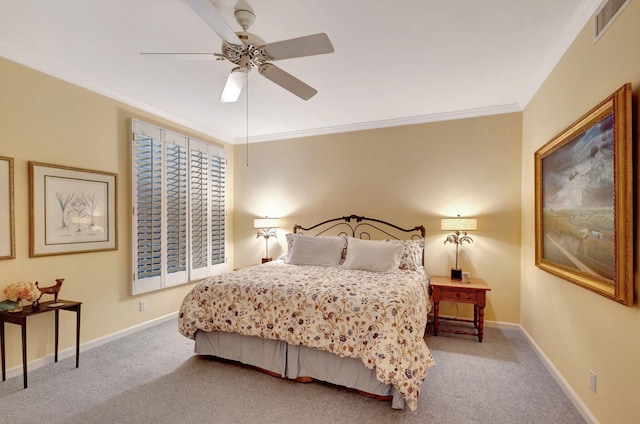 carpeted bedroom with crown molding and ceiling fan