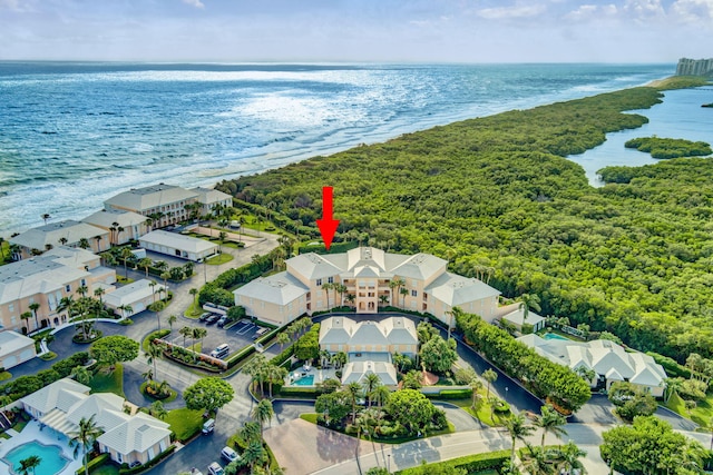 birds eye view of property featuring a water view