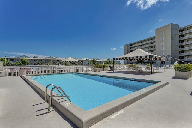 view of pool with a patio