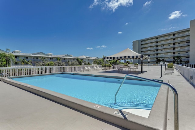 view of swimming pool featuring a patio