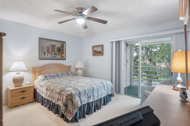 bedroom featuring light carpet, a textured ceiling, access to outside, and ceiling fan