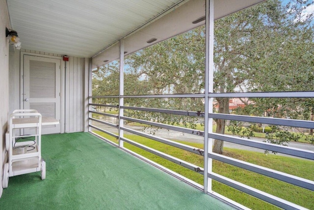 unfurnished sunroom featuring plenty of natural light