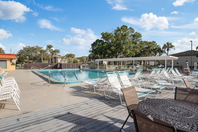 view of swimming pool featuring a patio