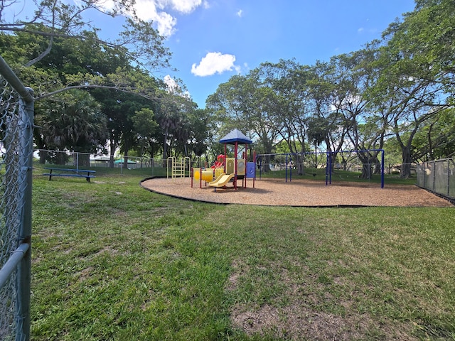 view of play area with a yard