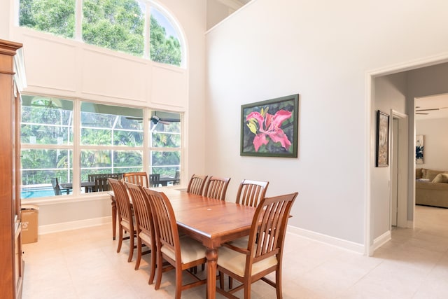 dining space with a high ceiling