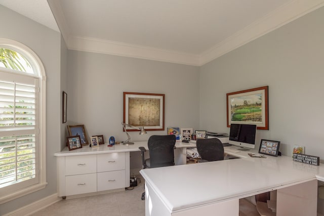 tiled home office featuring ornamental molding and plenty of natural light