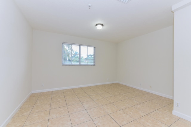 view of tiled spare room