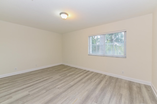 empty room featuring light hardwood / wood-style floors